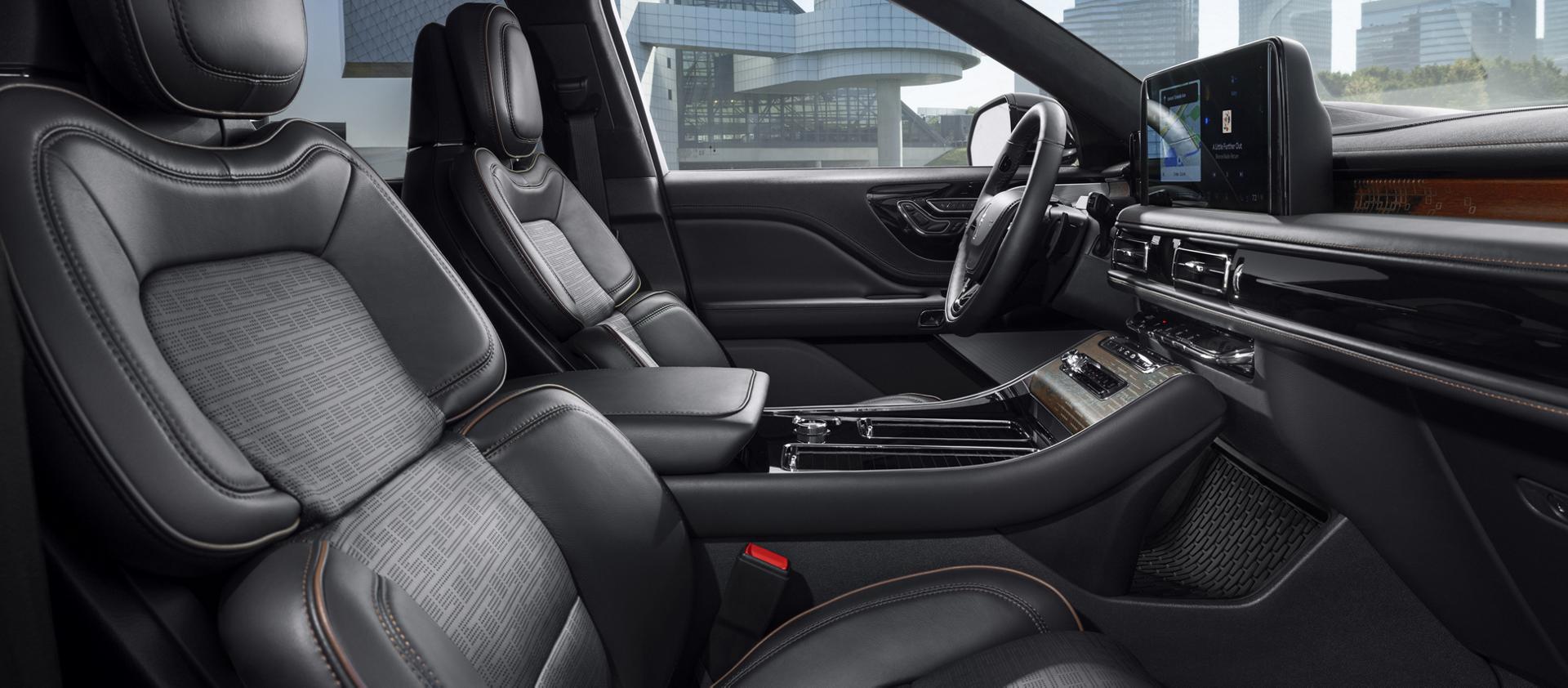 The interior of a 2027 Lincoln Aviator® Black Label™ SUV with the Invitation theme