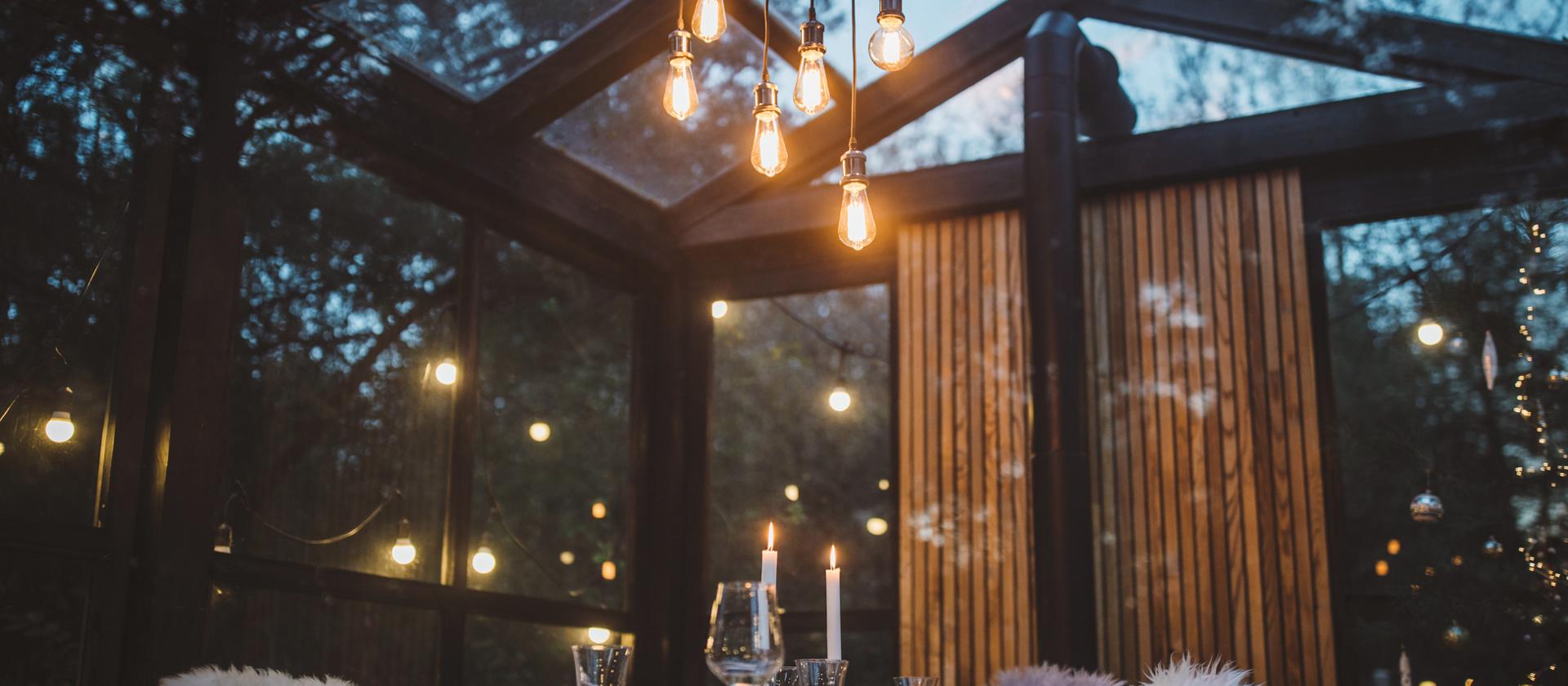 An upscale dining area suggests the welcoming nature of the 2025 Lincoln Black Label invitation theme