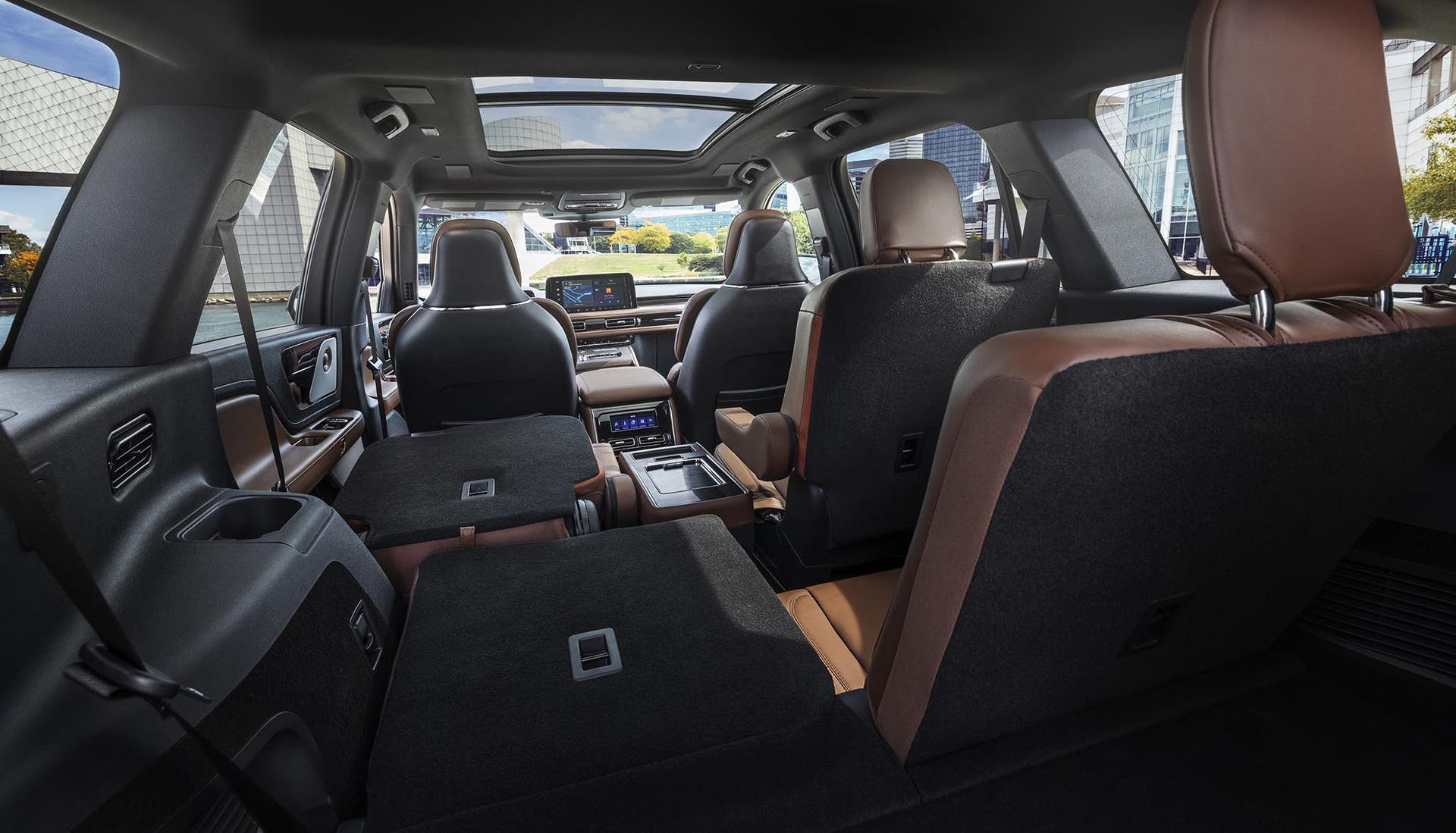 A third and second-row seat of a 2027 Lincoln Aviator® SUV is folded flat
