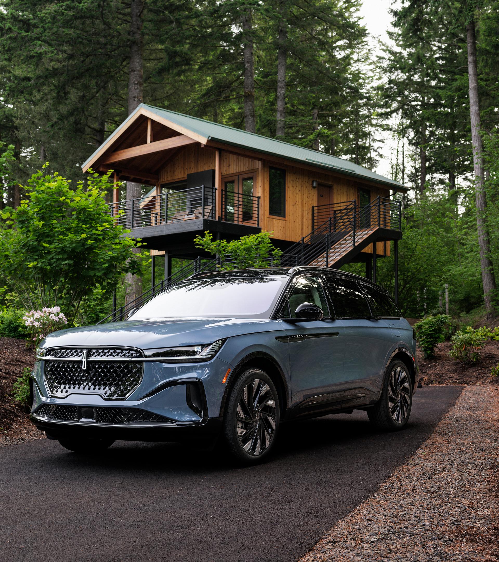 he front of a 2026 Lincoln Nautilus® SUV parked in front of a house