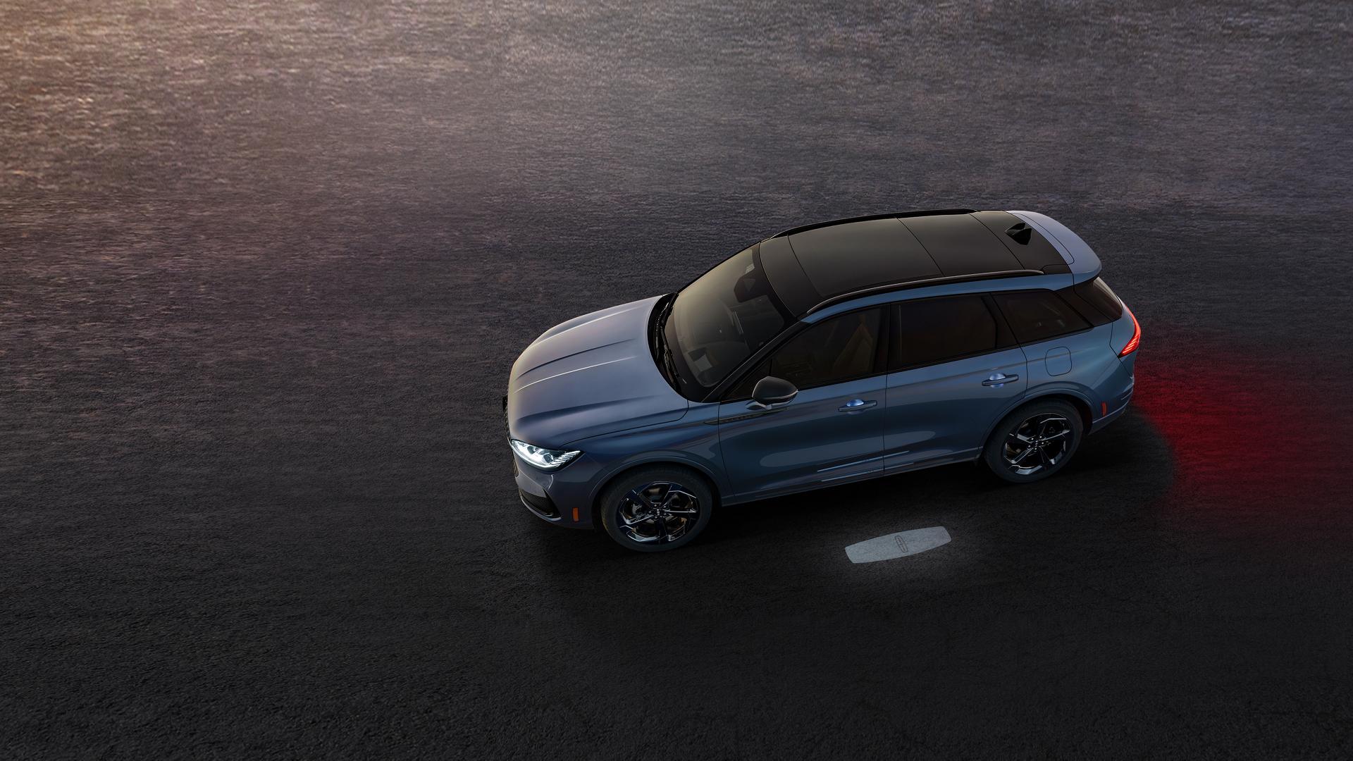 An overhead view of the 2027 Lincoln Corsair® Hybrid parked in a remote location at twilight