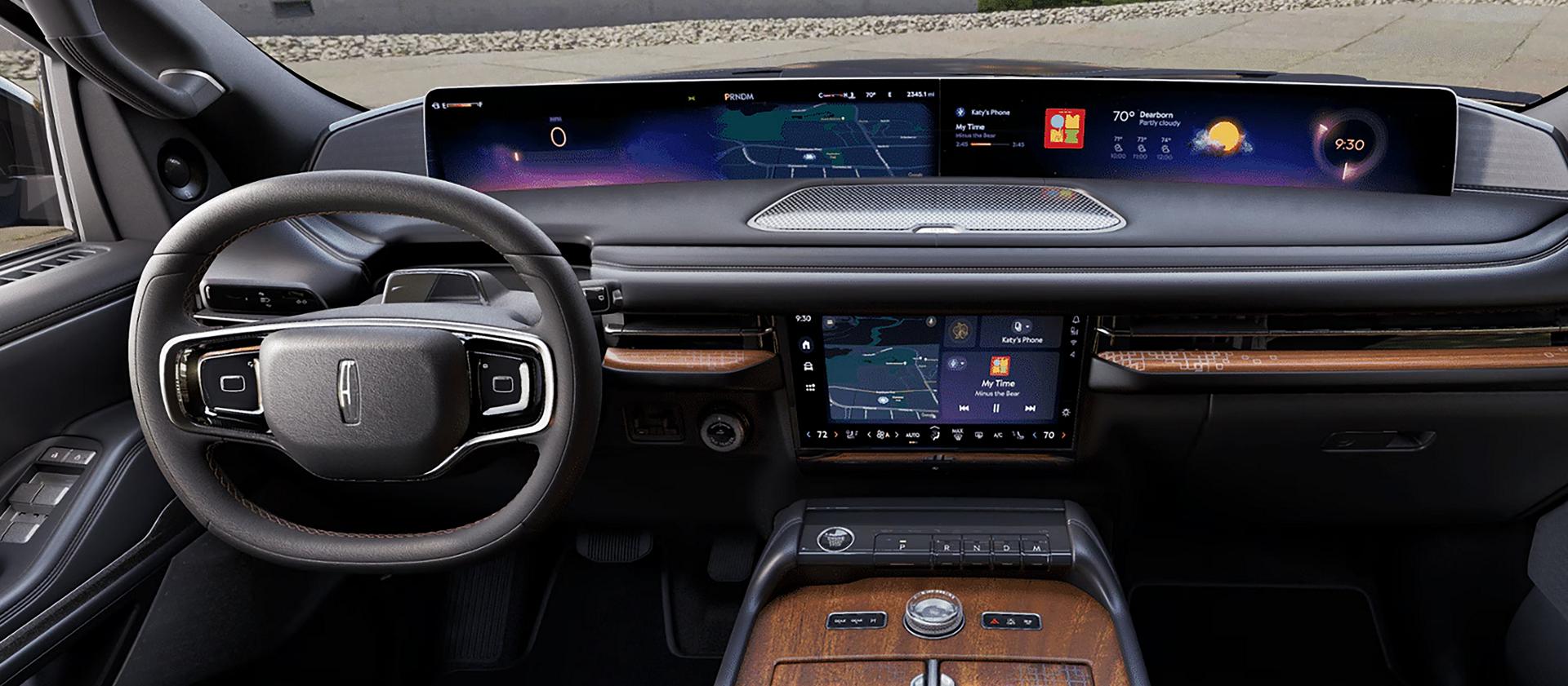The front cabin of a 2027 Lincoln Navigator® Black Label™ SUV in the Invitation theme