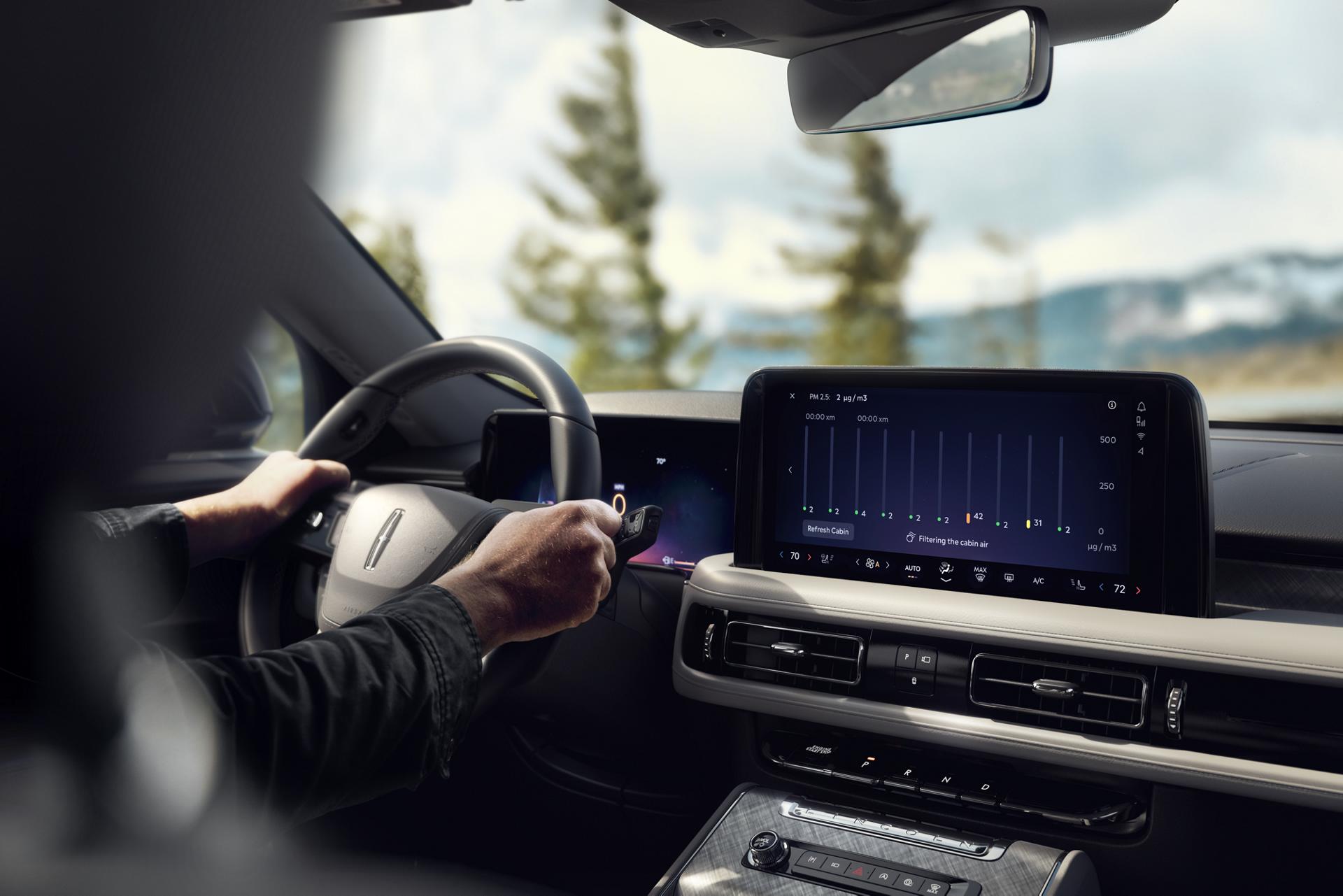 A man driving the 2025 Lincoln Aviator.