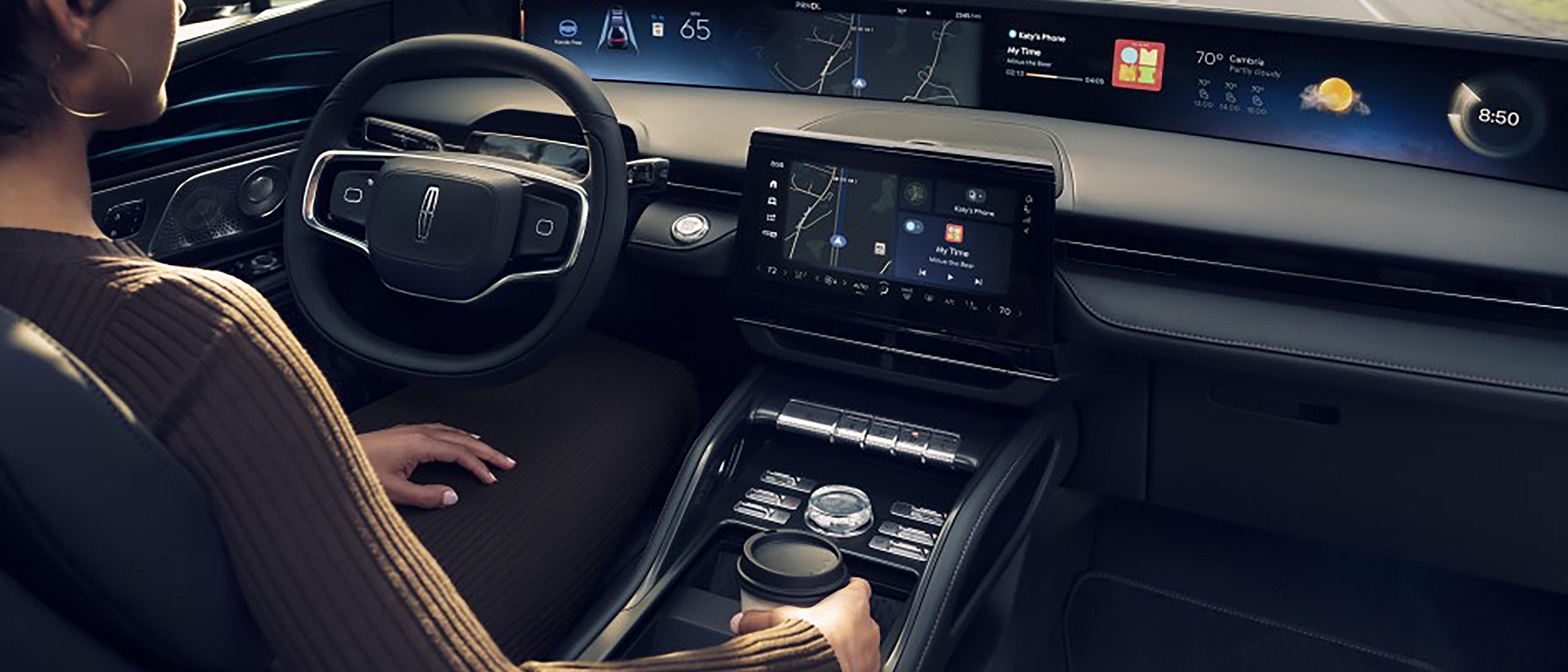 A driver of a Lincoln SUV enjoys hands-free highway driving courtesy of Lincoln BlueCruise