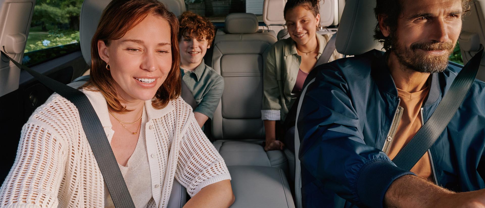 A family enjoys the spaciousness inside a 2027 Lincoln Aviator® SUV