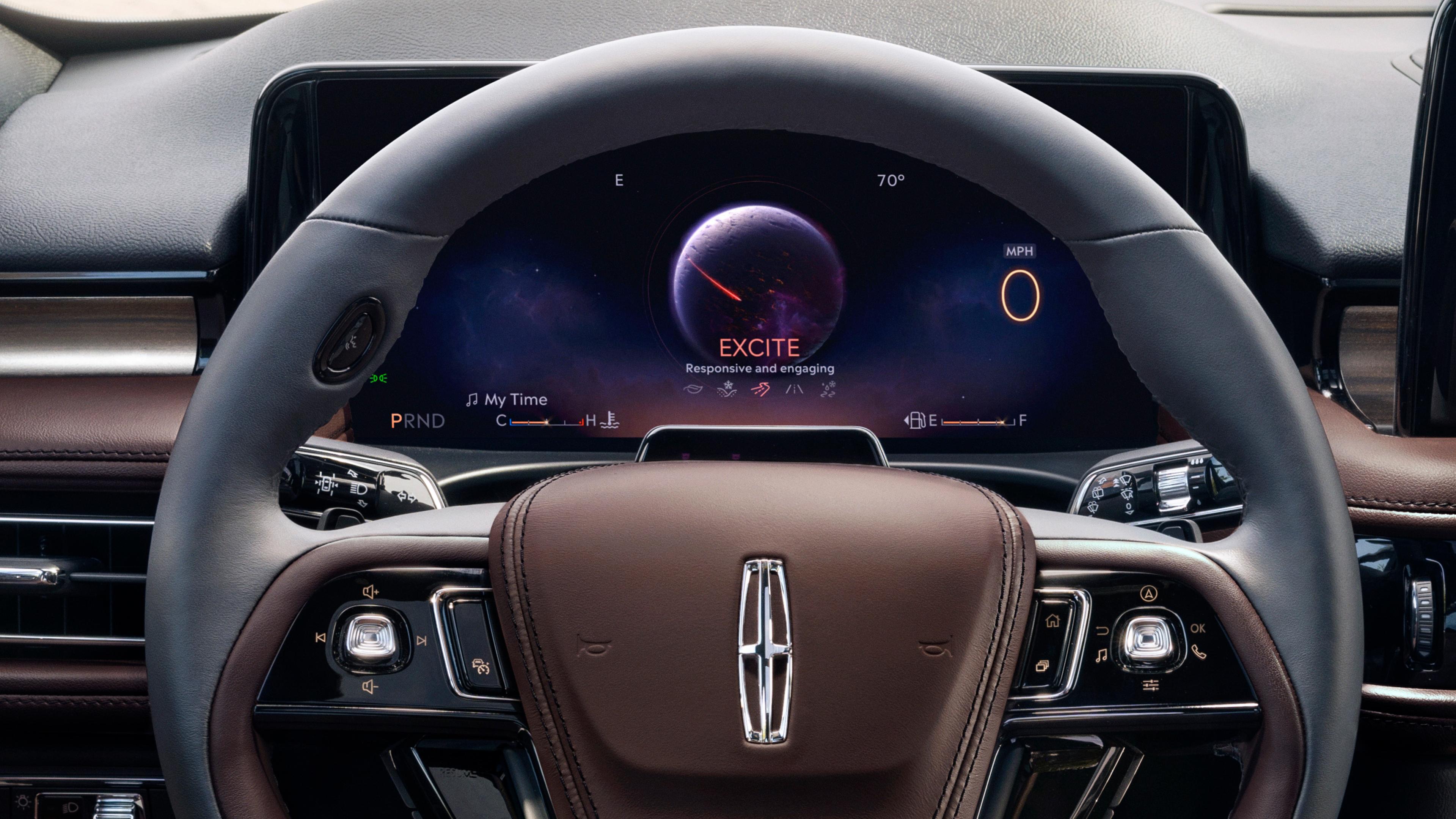 The driver's information cluster behind the steering wheel of a 2027 Lincoln Aviator® SUV