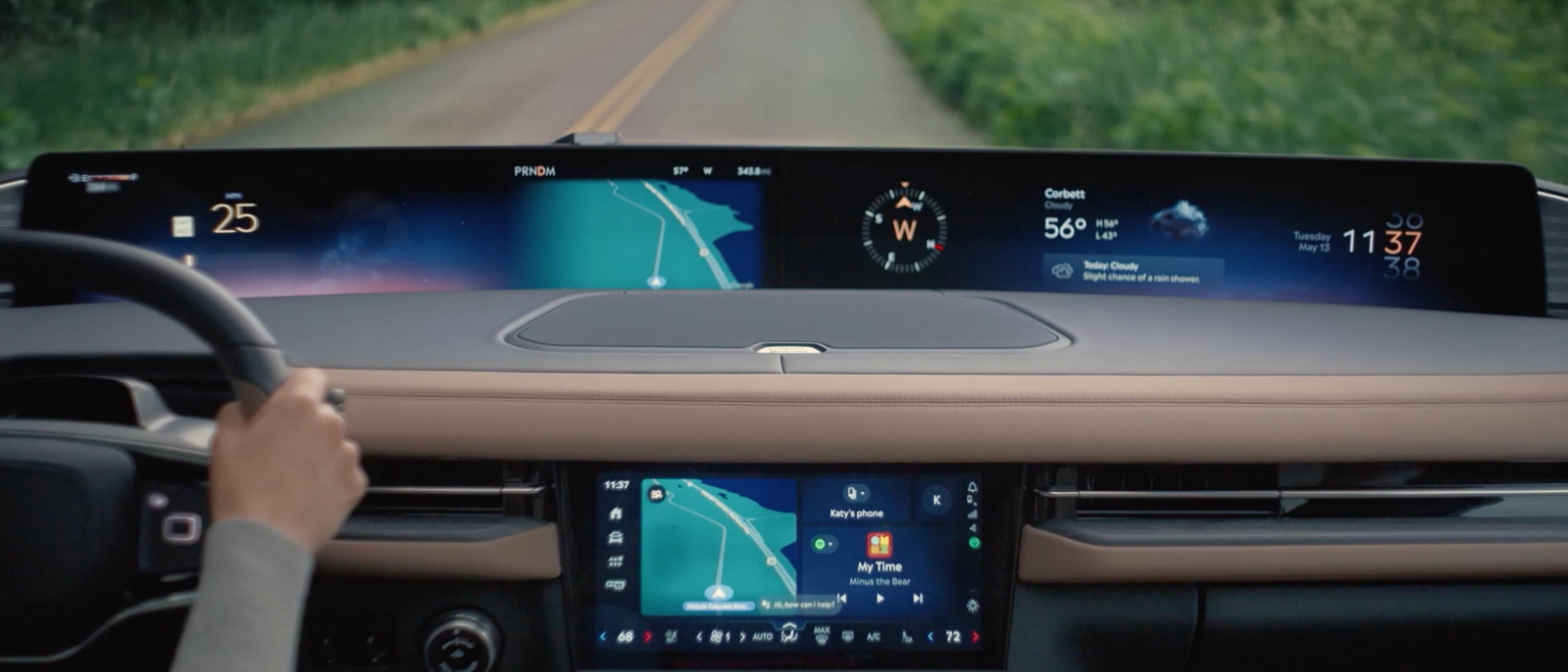 The panoramic display and center touchscreen show driving directions