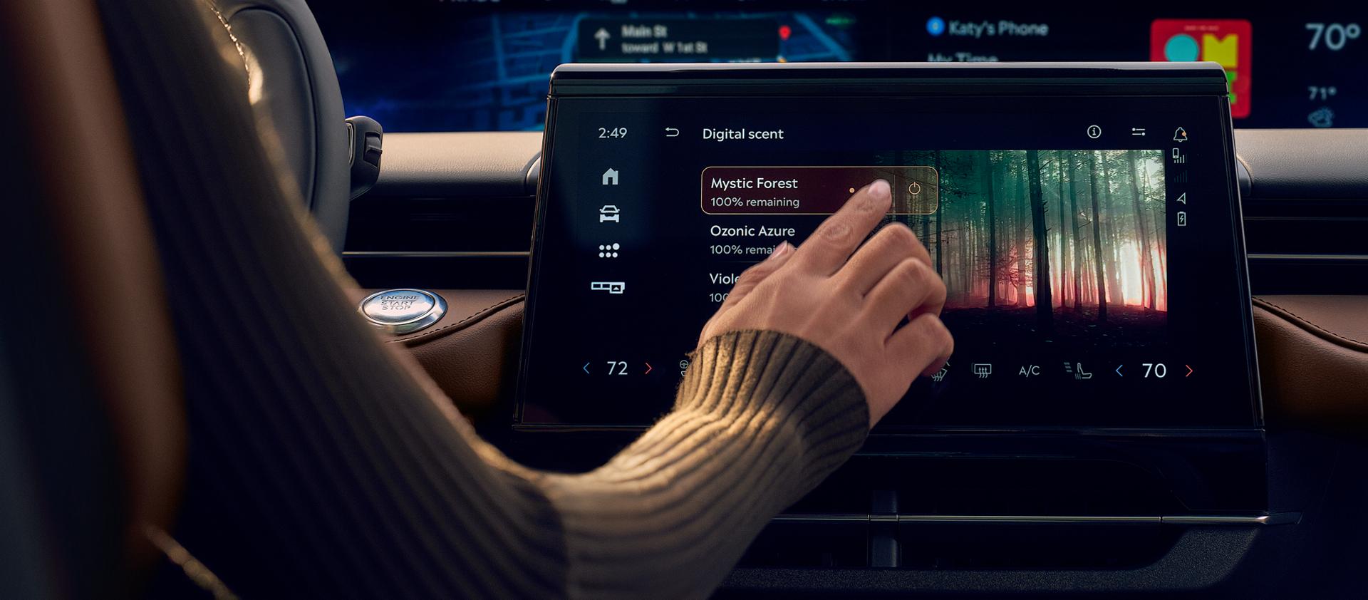 The driver of a 2026 Lincoln Nautilus® SUV adjusts the Digital Scent selection