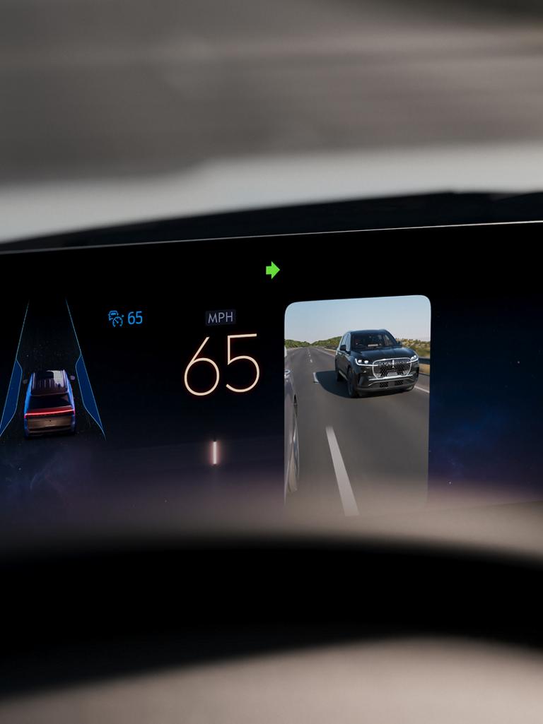 A 2026 Lincoln Navigator Is being Driven on a Hands-Free Blue Zone Highway