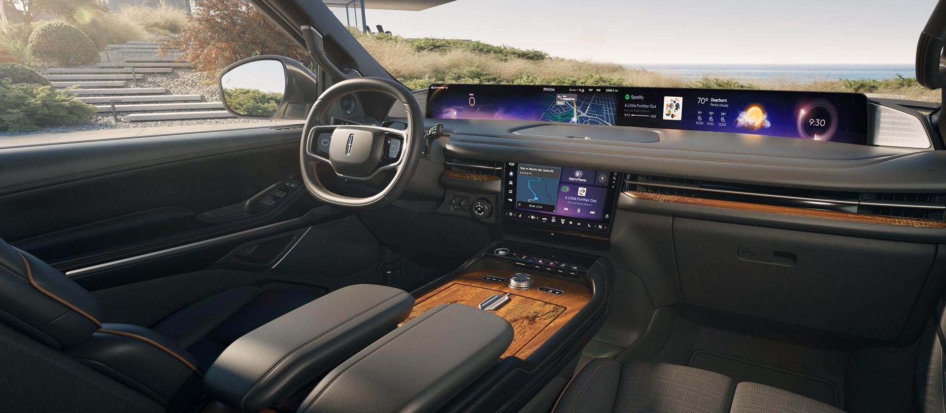 The front cabin of a 2027 Lincoln Navigator® Black Label™ SUV in the Invitation theme.