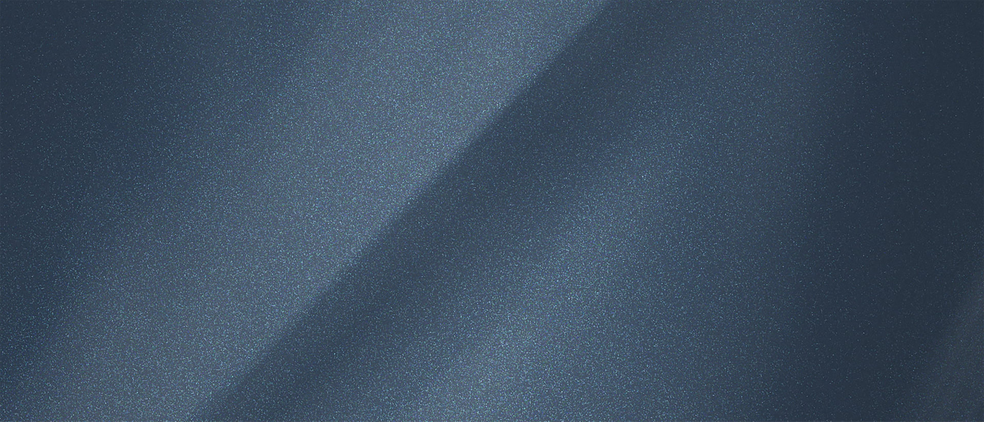 A color chip representing the extra-cost Nocturnal Blue Metallic Clearcoat exterior color