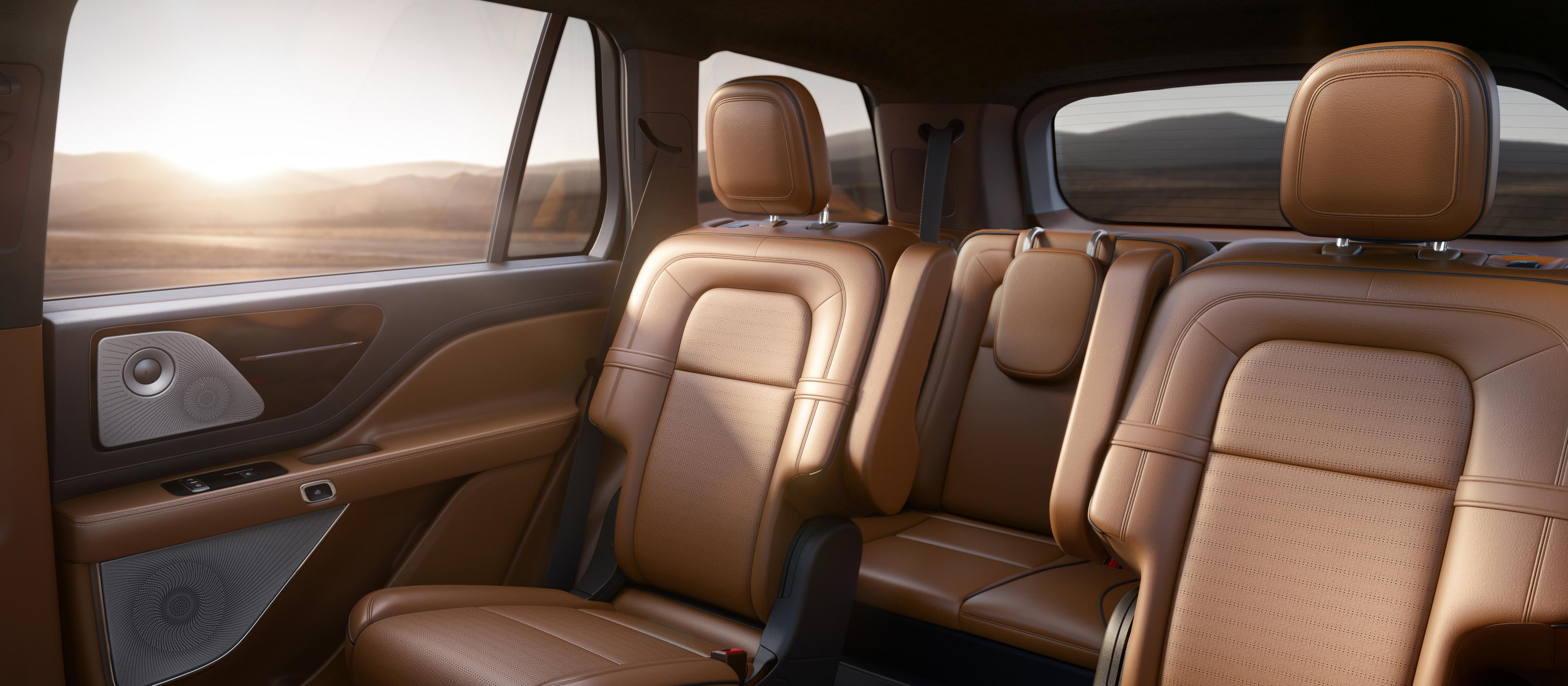 Captain’s seats in the second row of a 2025 Lincoln Black Label Aviator® SUV are shown in the Flight interior theme