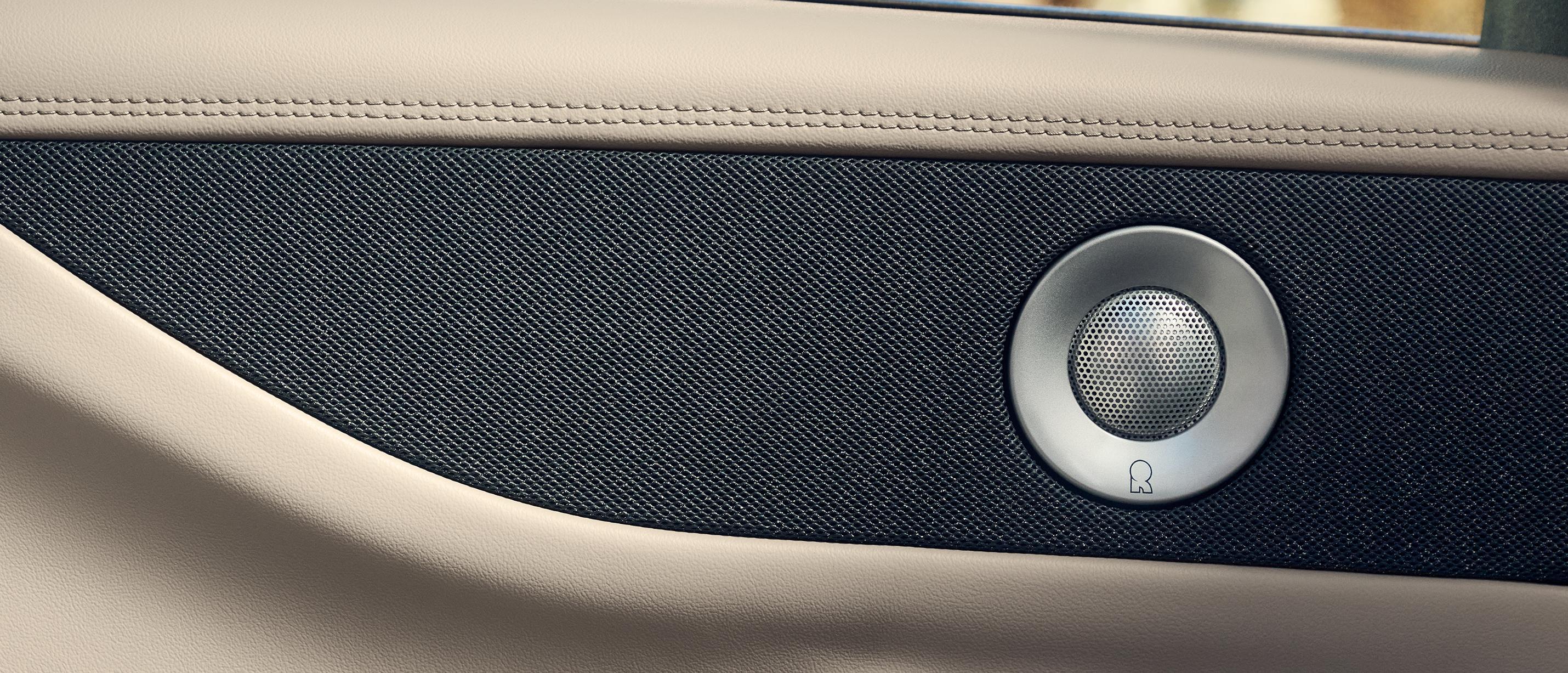 The front passenger door of a 2027 Lincoln Navigator® SUV with an embedded speaker
