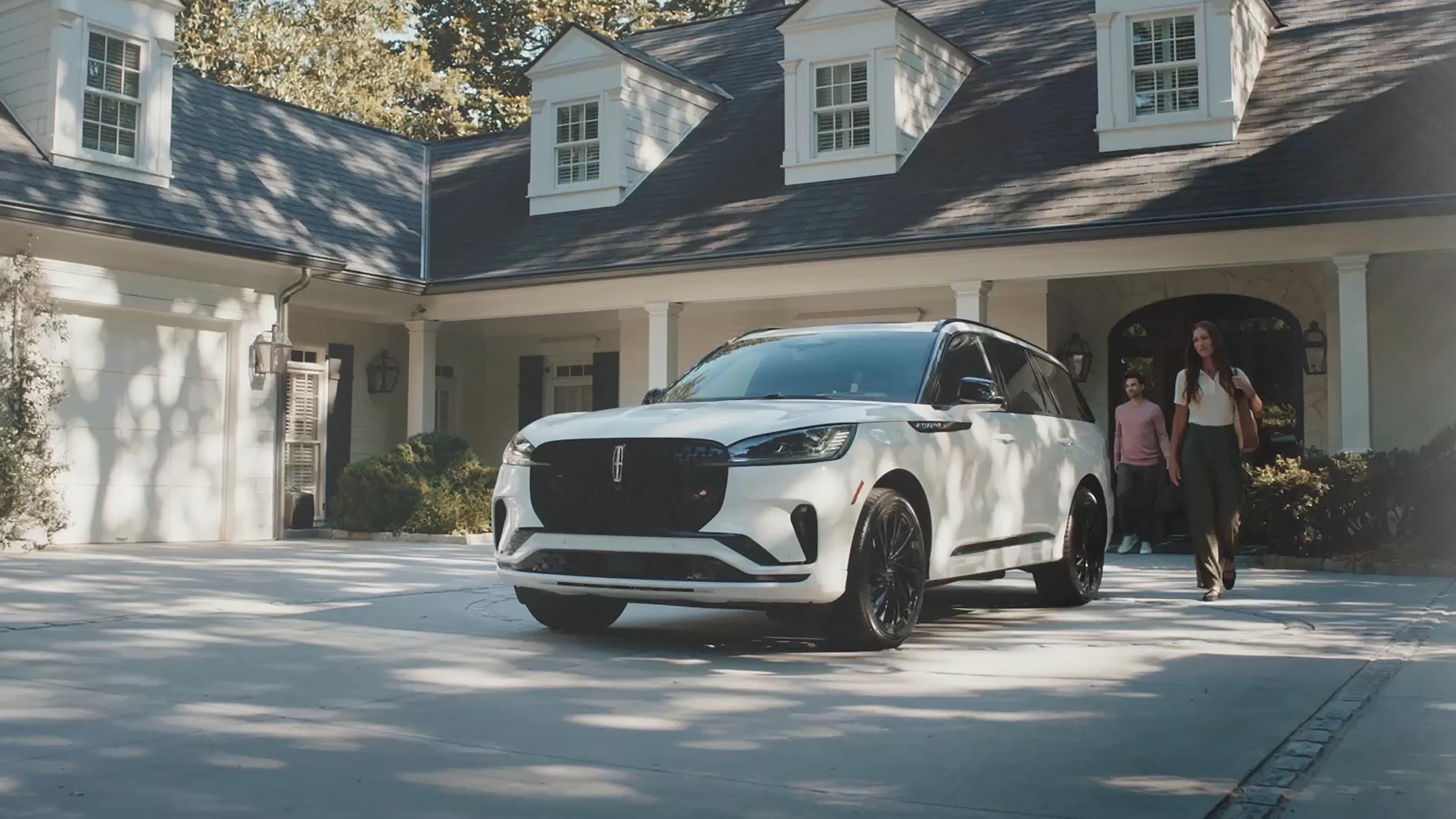 A couple approach a 2026 Lincoln Aviator® SUV