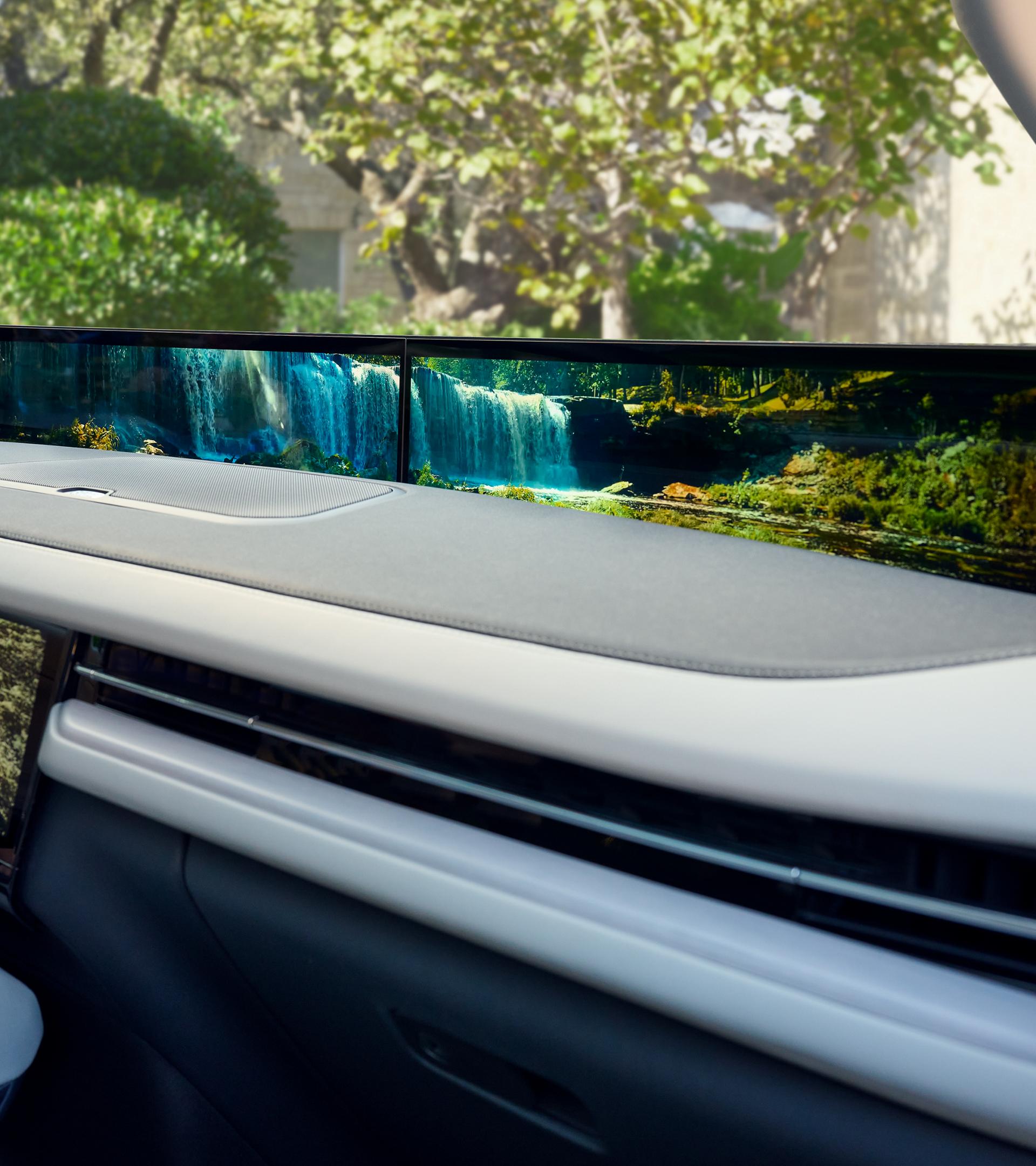 An angled interior shot of the 2026 Lincoln Navigator shows the Waterfall Rejuvenate experience playing on both displays
