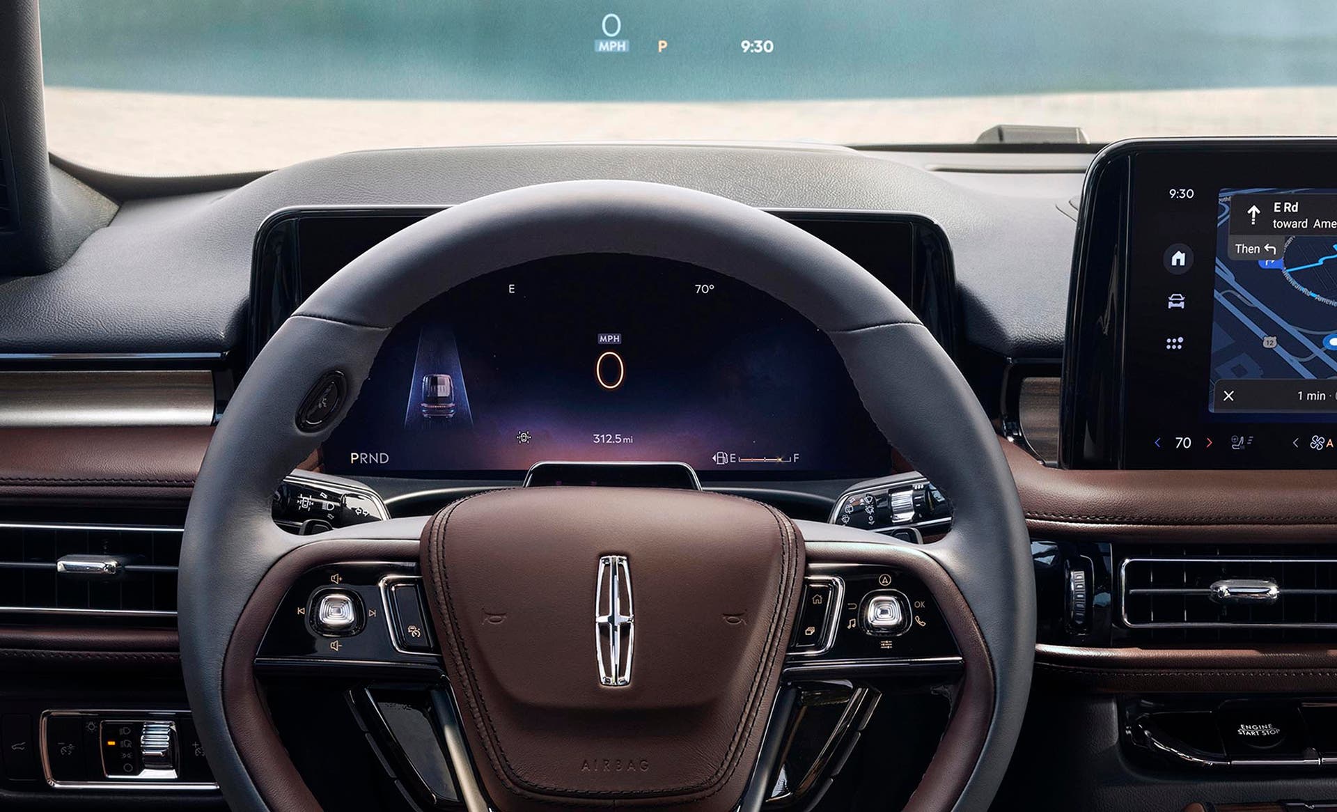 Driving information is projected on the windshield via the head up display system