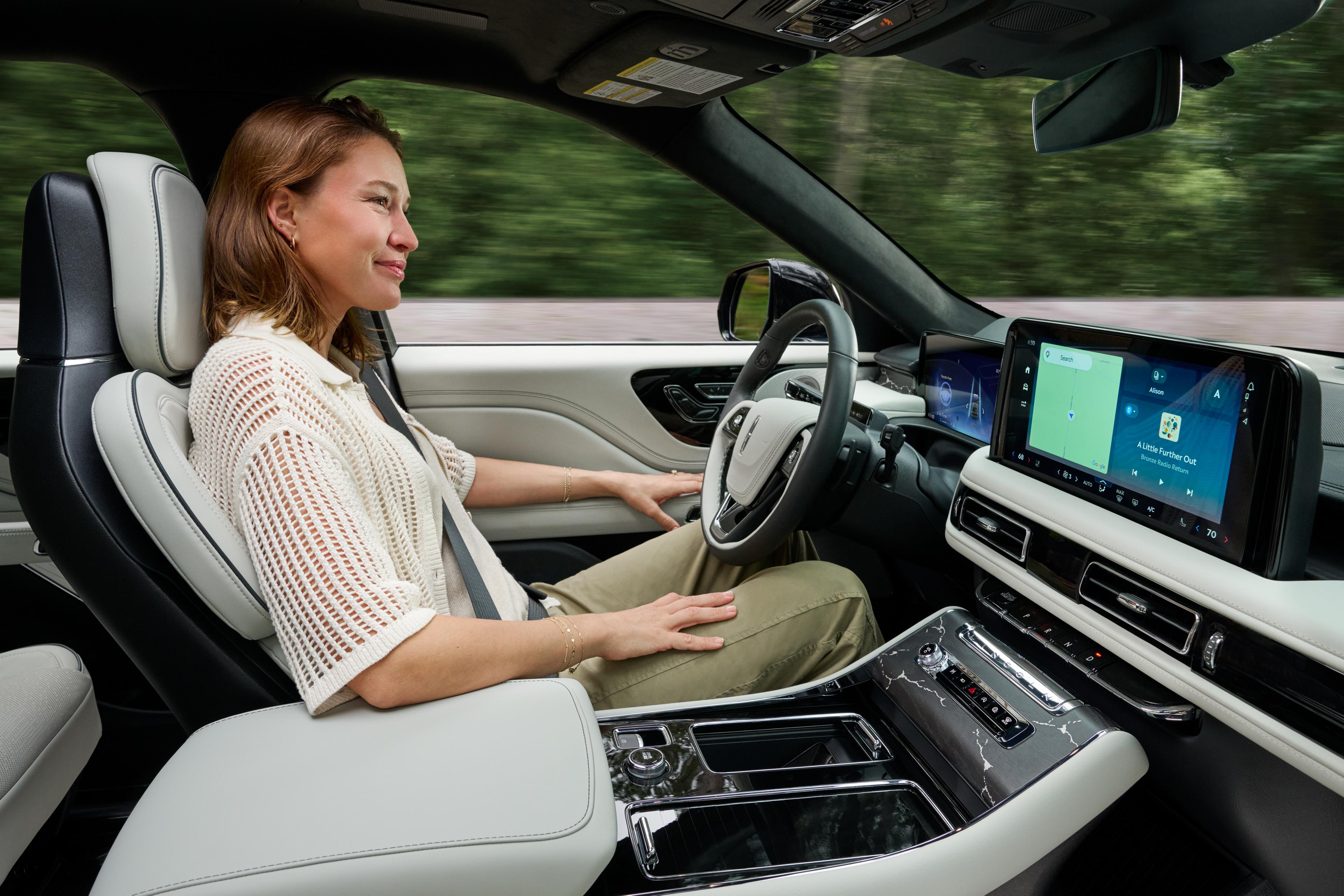 A driver of a 2027 Lincoln Aviator® SUV safely enjoys hands-free highway diving.
