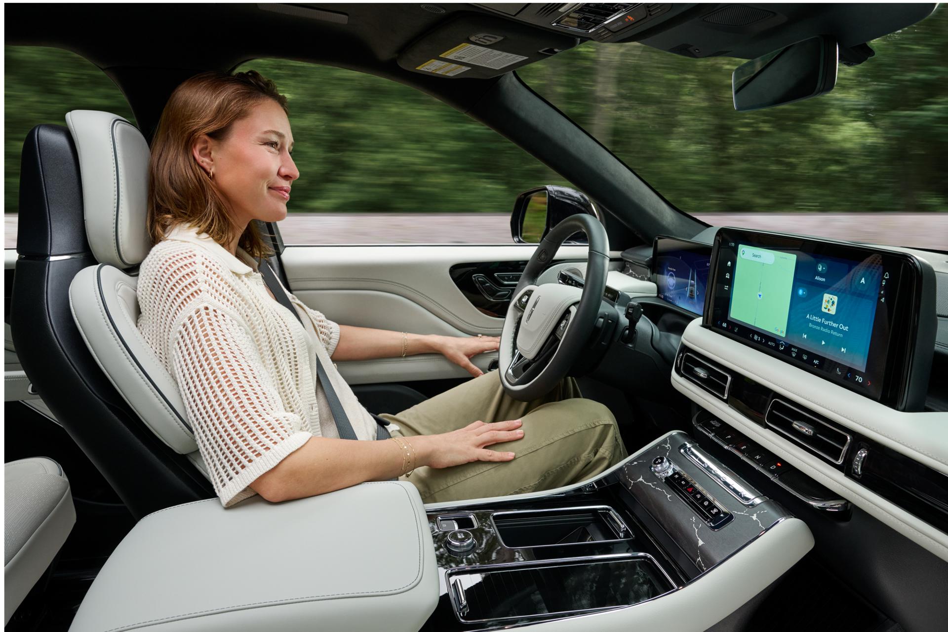 A driver of a 2027 Lincoln Aviator® SUV safely enjoys hands-free highway diving.