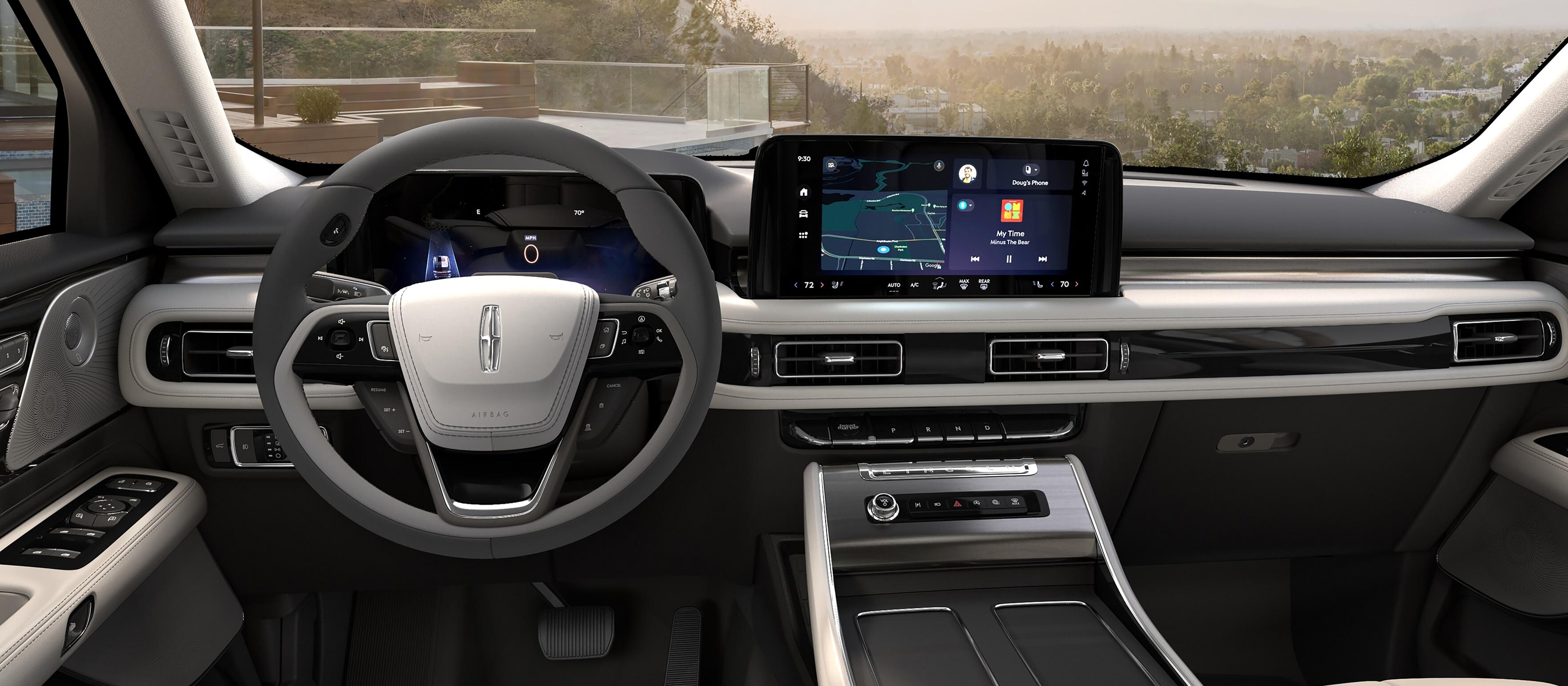 The interior of a 2026 Lincoln Aviator® SUV from the second row looking through the windshield