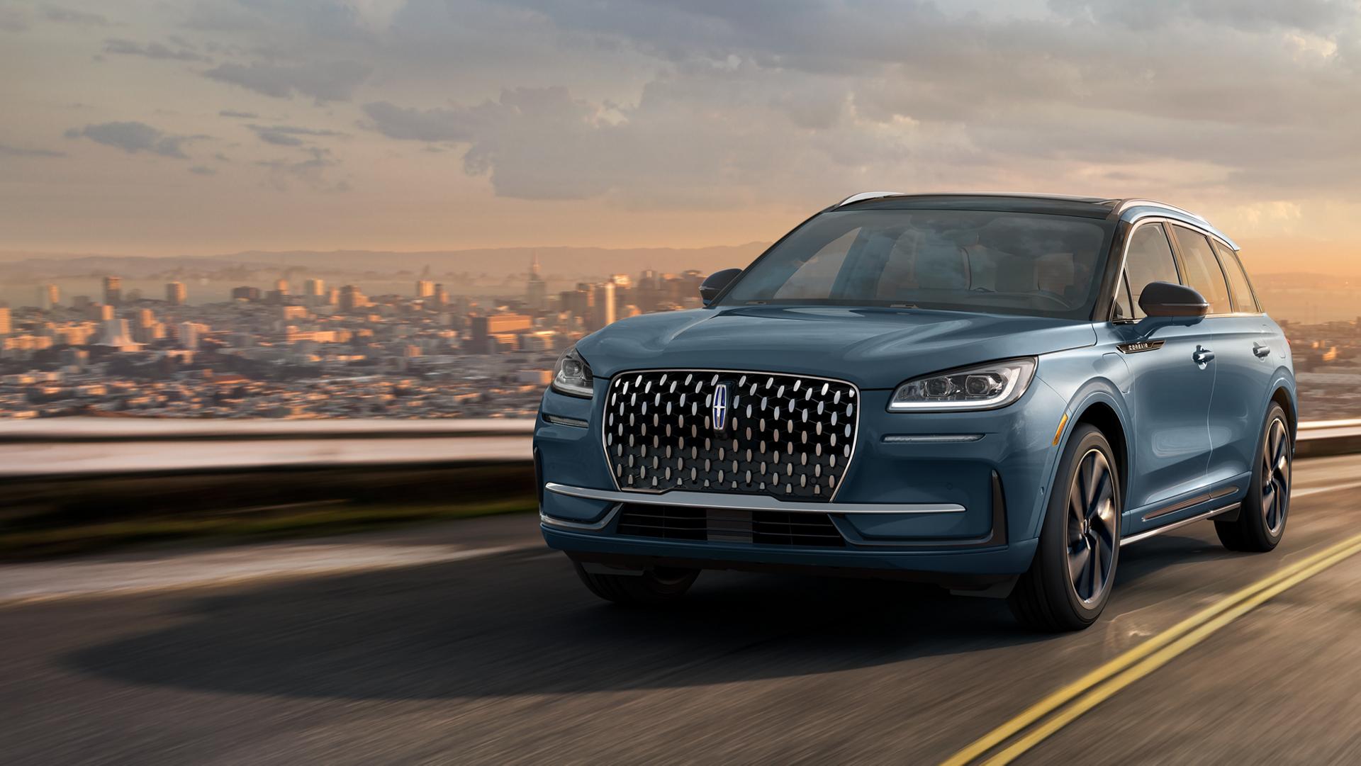 The Lincoln Corsair® SUV driving down a road