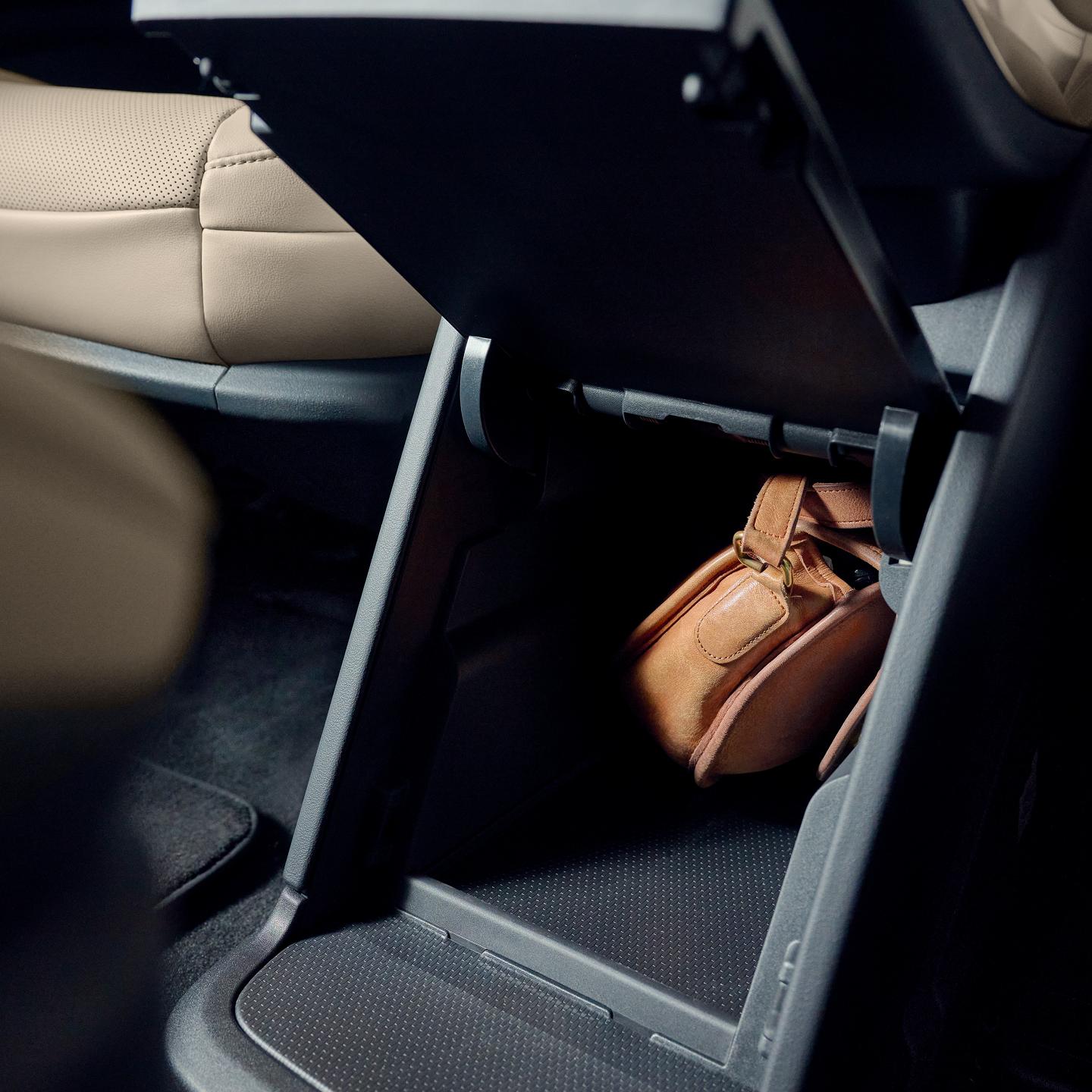 The second-row console provides convenient storage to safely stow small personal items
