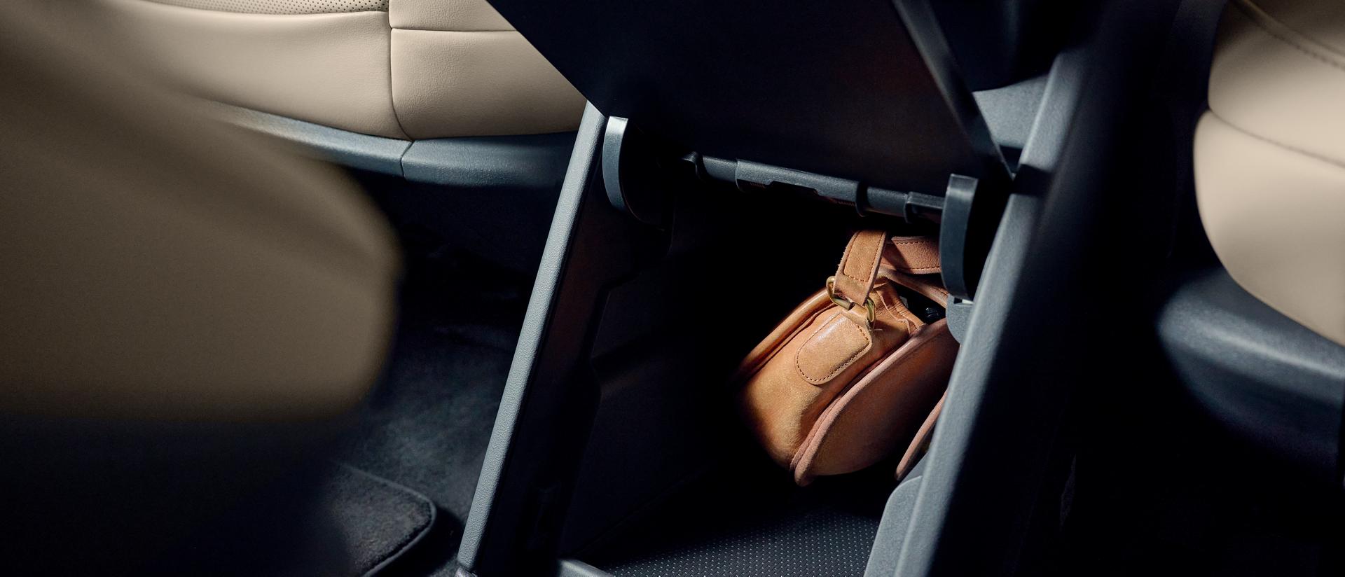 The second-row console provides convenient storage to safely stow small personal items