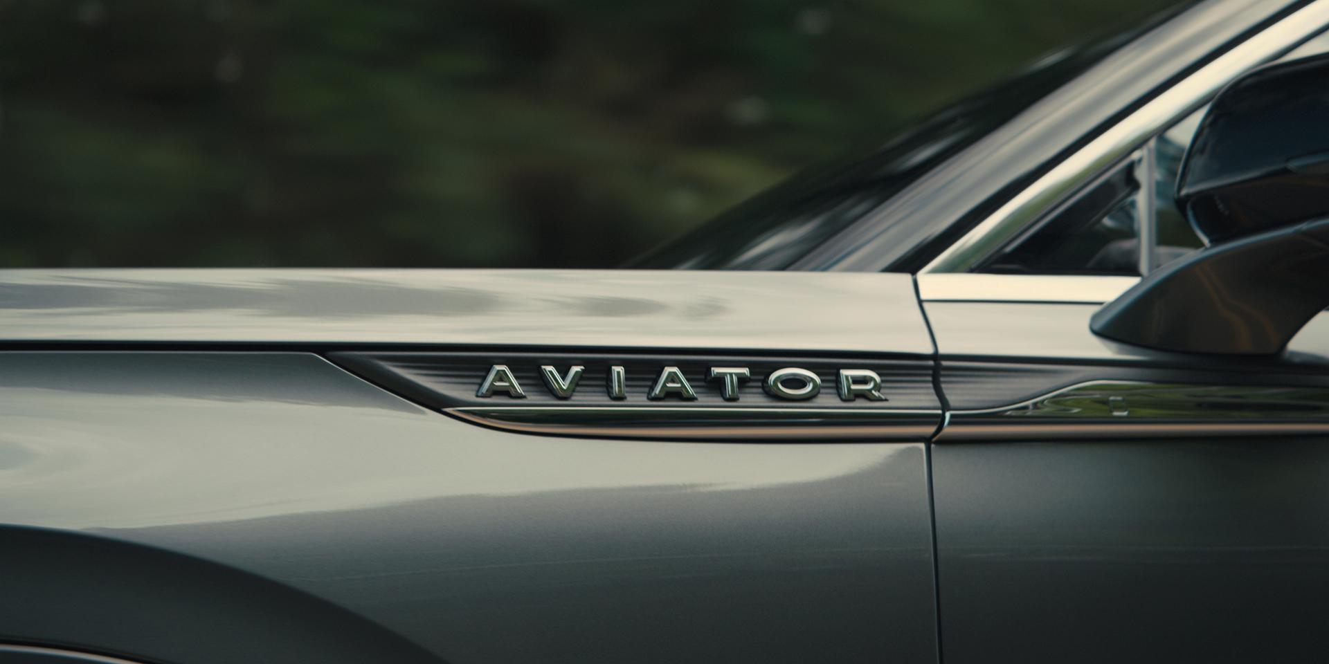 The side badging of a 2027 Lincoln Aviator® SUV with lettering that reads Aviator