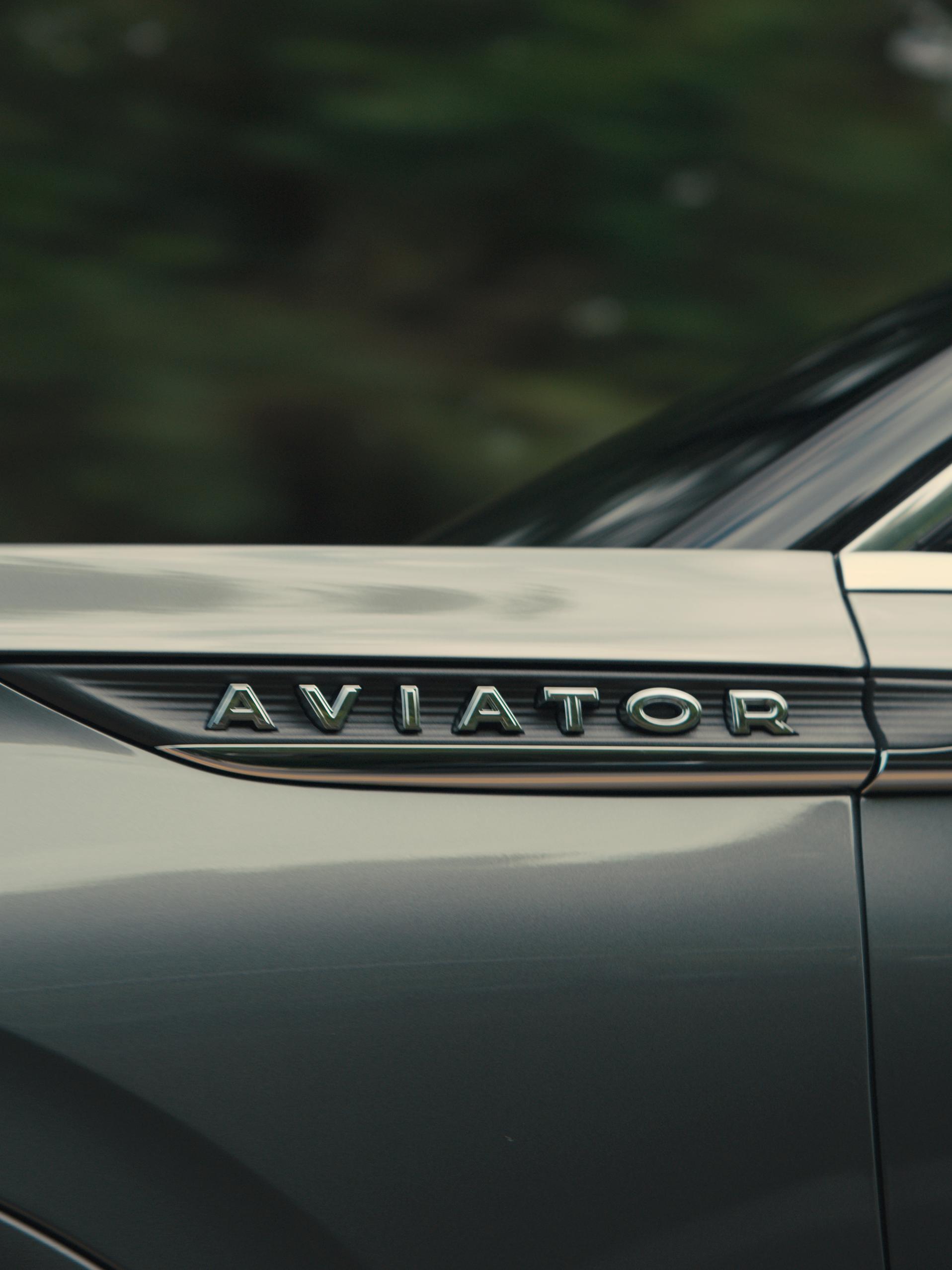 The side badging of a 2027 Lincoln Aviator® SUV with lettering that reads Aviator