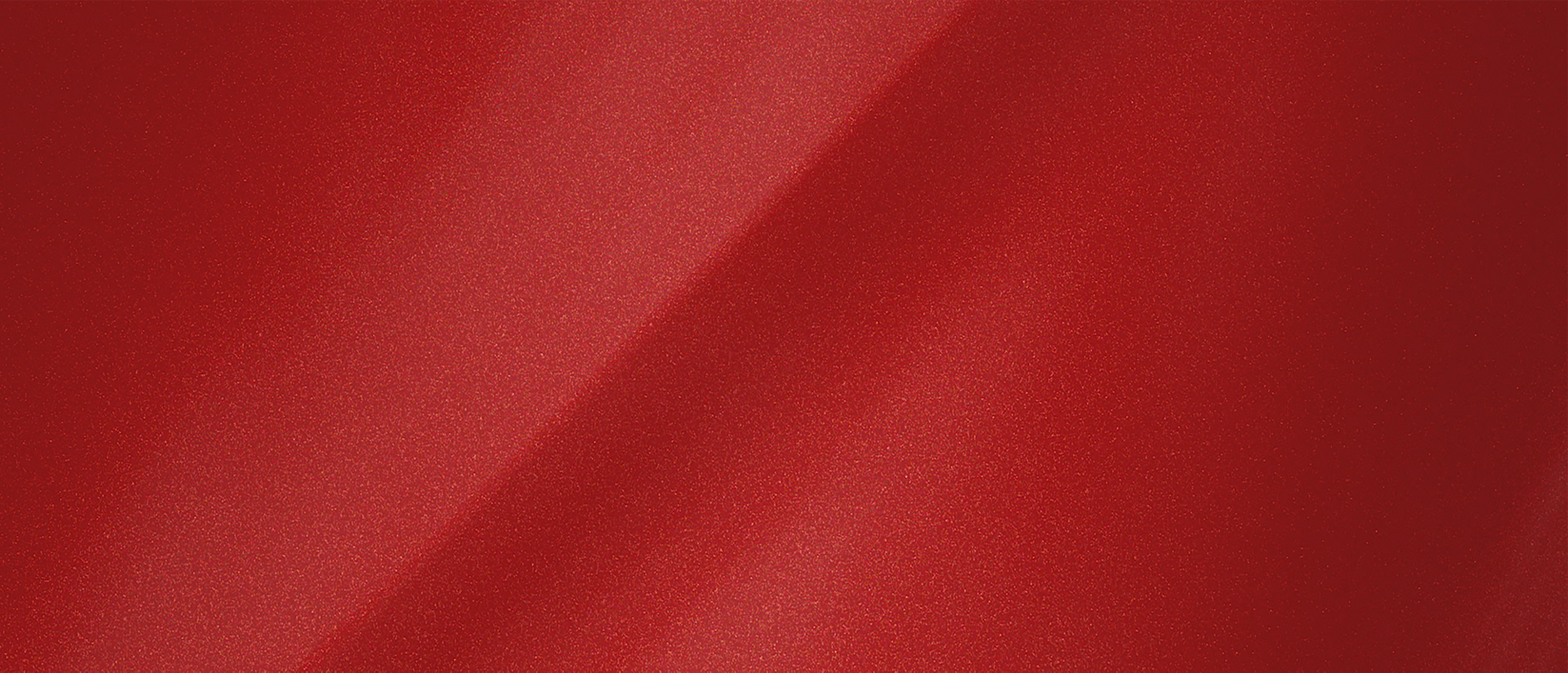 A color chip representing the extra-cost Chroma Flame Red Metallic Clearcoat exterior color