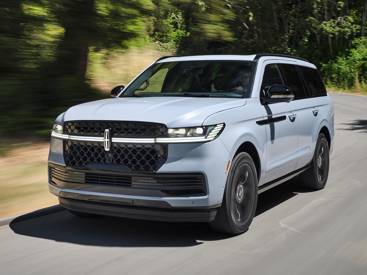 The 2027 Lincoln Navigator driving down the road