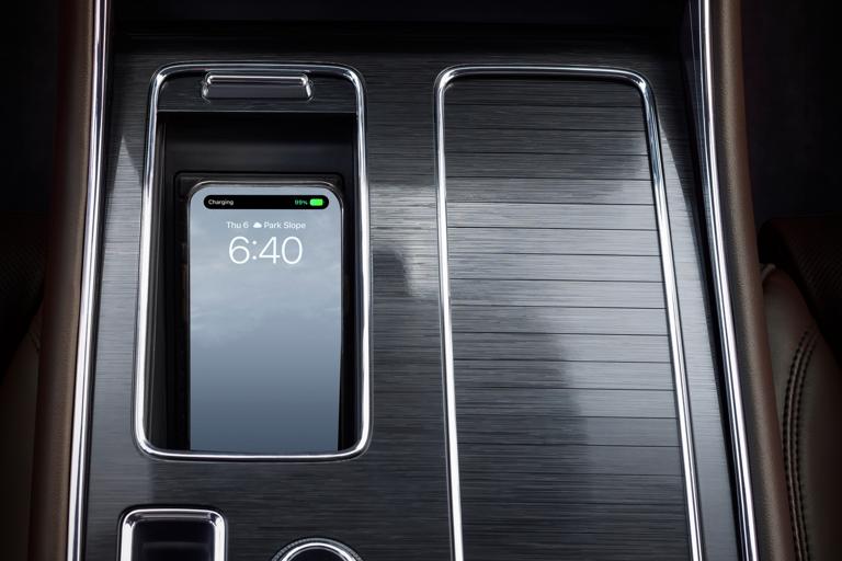 A mobile device is placed on a wireless charging pad