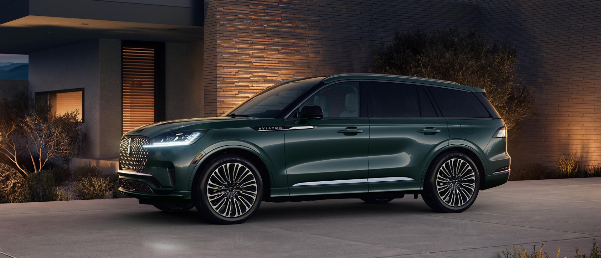 A 2026 Lincoln Black Label Aviator® SUV is parked in the driveway of modern home in the southwest