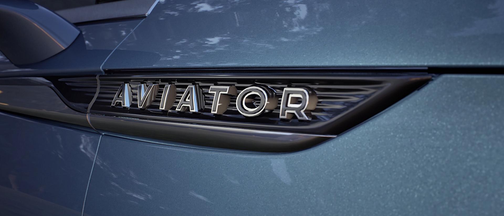 Badging on the side of a Lincoln SUV reads Aviator