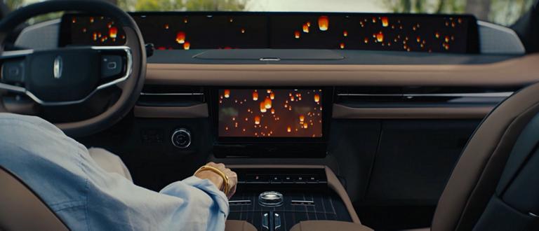 The interior of a A 2026 Lincoln Black Label Navigator® SUV with a Lincoln Rejuvenate sequence shown on the panoramic display